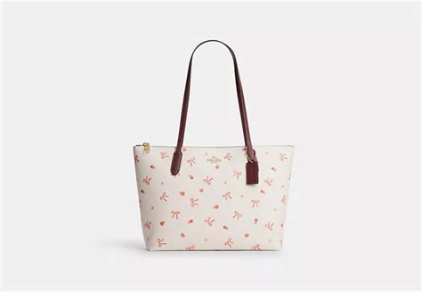 coach outlet bow bag|coach zip top bow print.